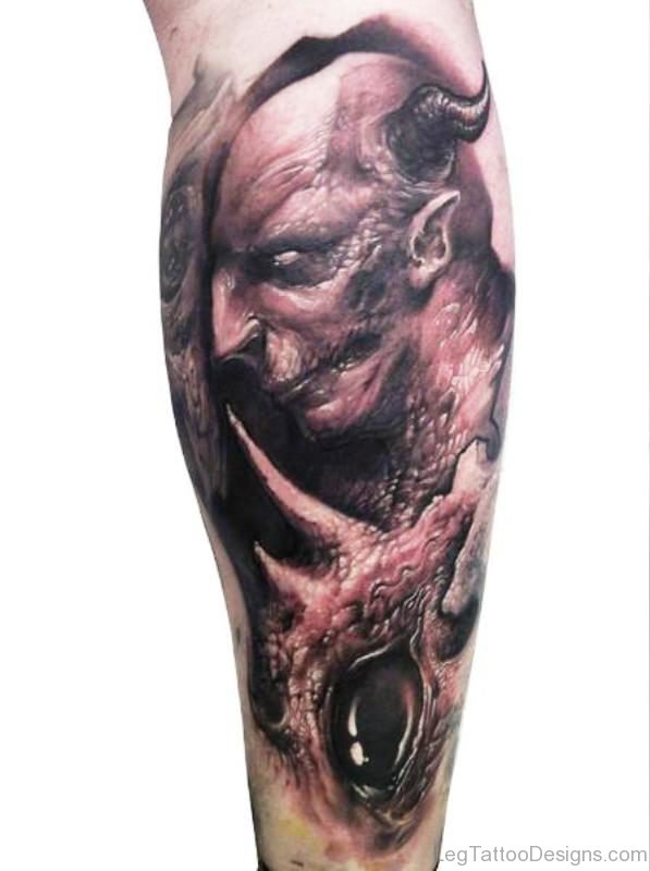 Scary Evil Tattoo On Leg