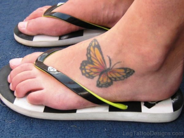 Simple And Nice Butterfly Tattoo On Foot