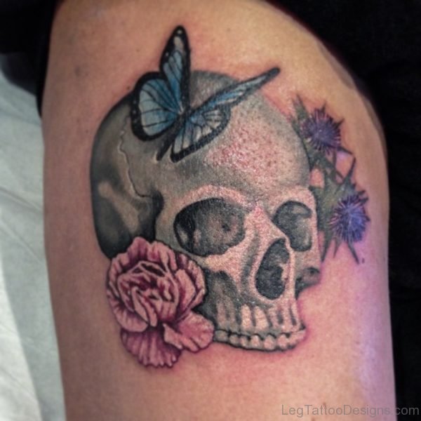 Skull And Butterfky Tattoo On Thigh
