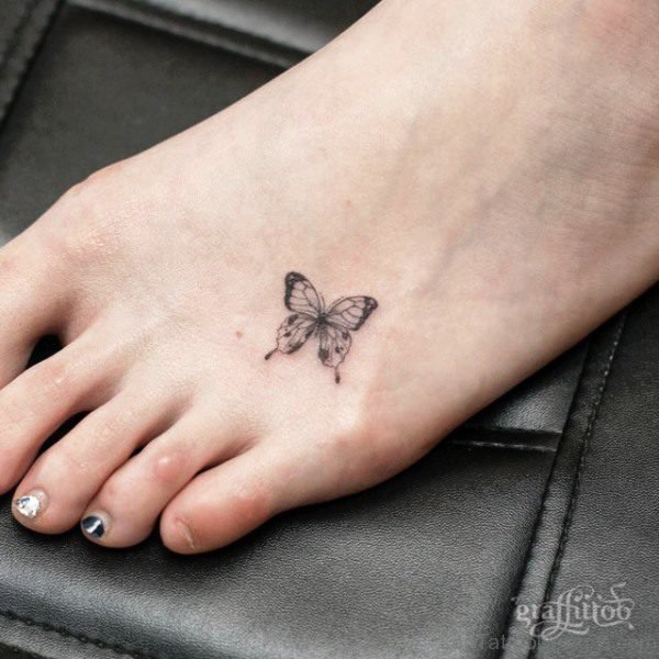 Small Butterfly Tattoo On Foot
