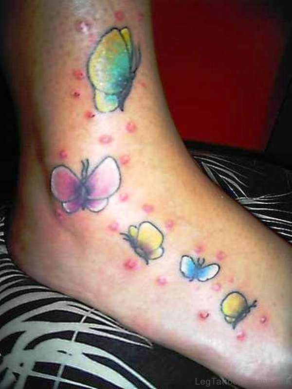 Small Colorful Butterlies Tattoo On Foot
