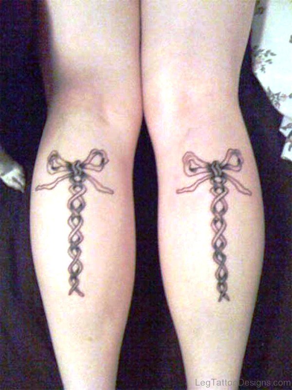 Small Corset Tattoos On Both Legs