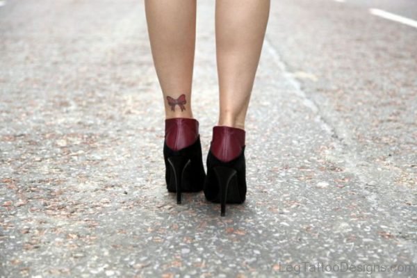 Small Red Bow Ankle Tattoo