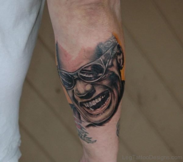Smiling Face Portrait Tattoo On Leg