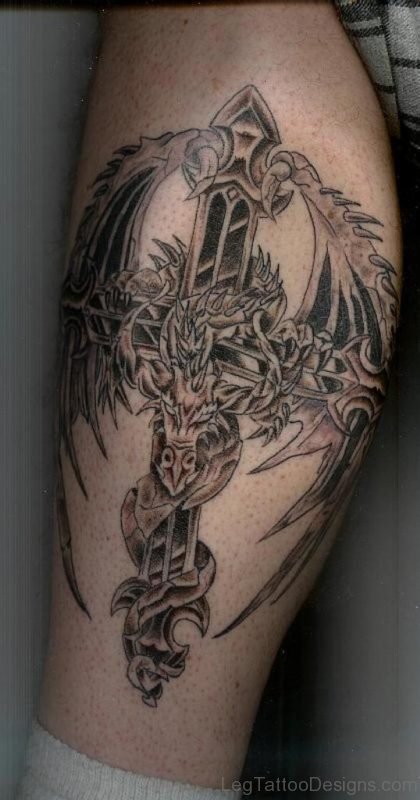 Stunning Cross Tattoo On Leg