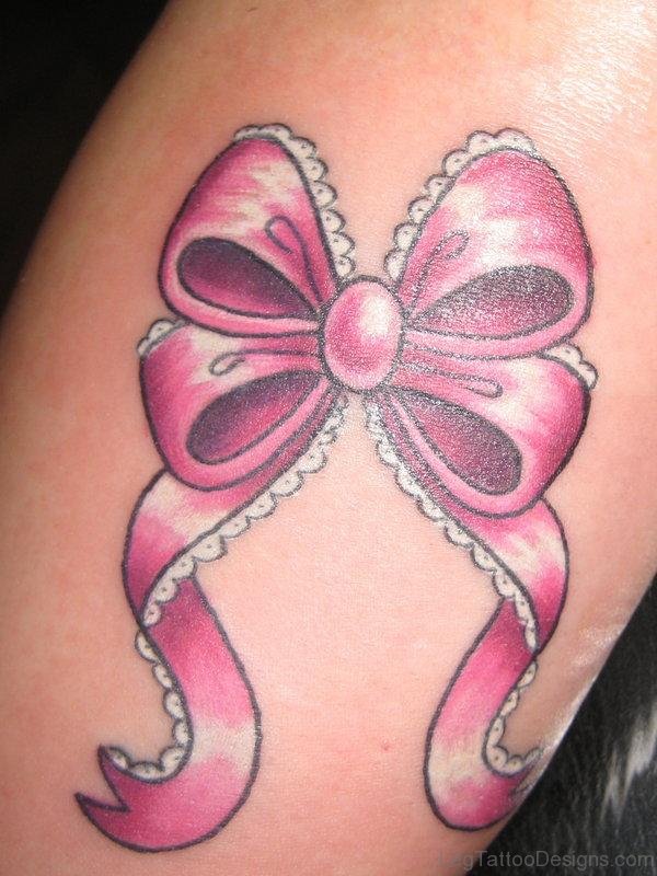 Sweet Pink Bow Tattoo On Thigh