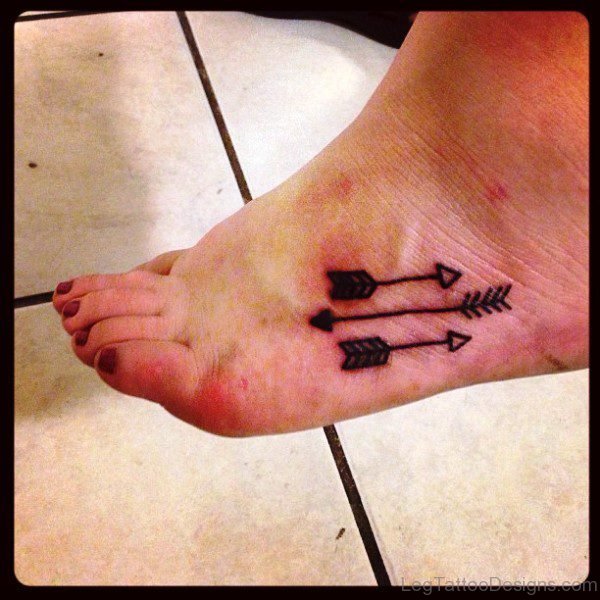 Three Black Arrows Tattoo On Foots