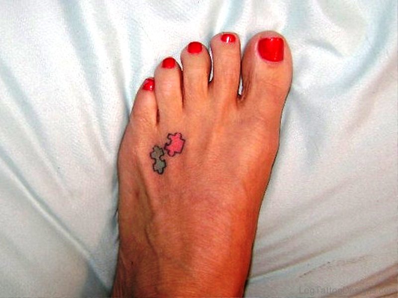 Tiny Autism Tattoo On Foot