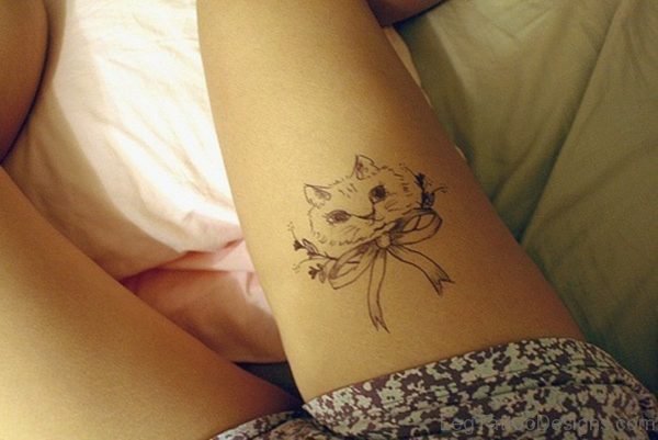 Tiny Cat Head Tattoo On Thigh