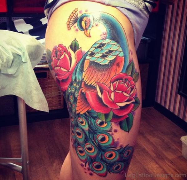 Trendy Peacock Tattoo On Thigh