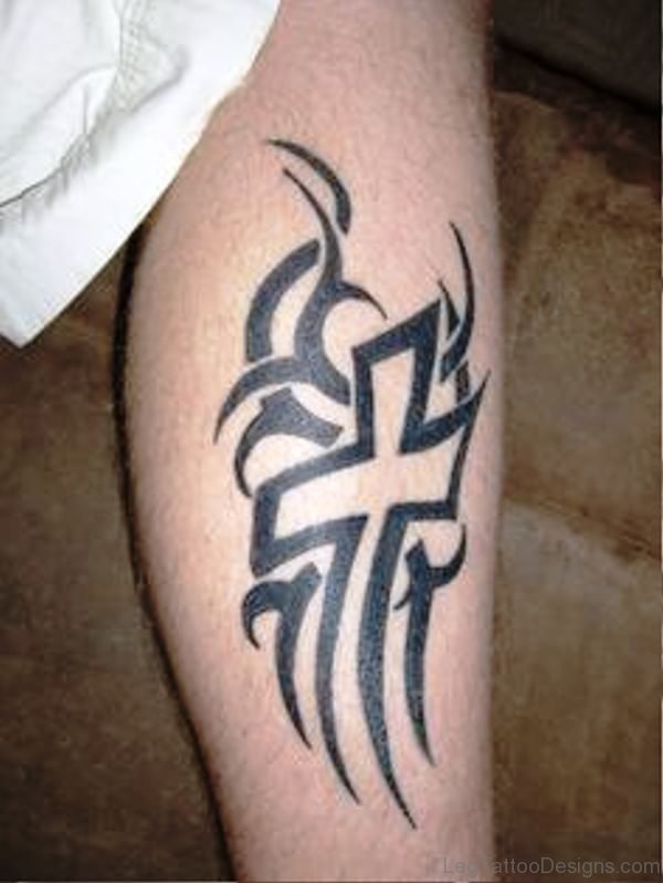 Tribal Black Cross Tattoo On Leg