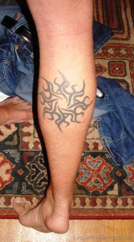 Tribal Sun Tattoo On Calf