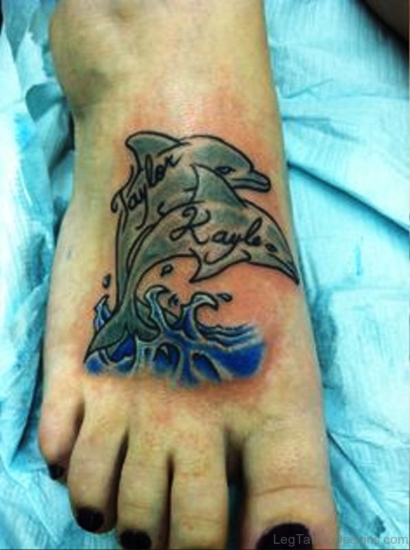 Two Grey Dolphins Tattoo On Foot