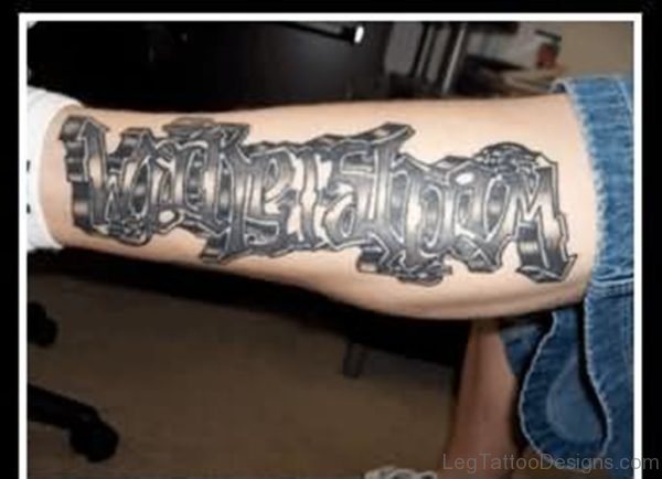 Wickersham Ambigram Tattoo On Left Leg
