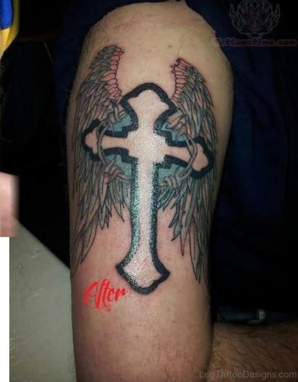 Wings And Cross Tattoo On LEg