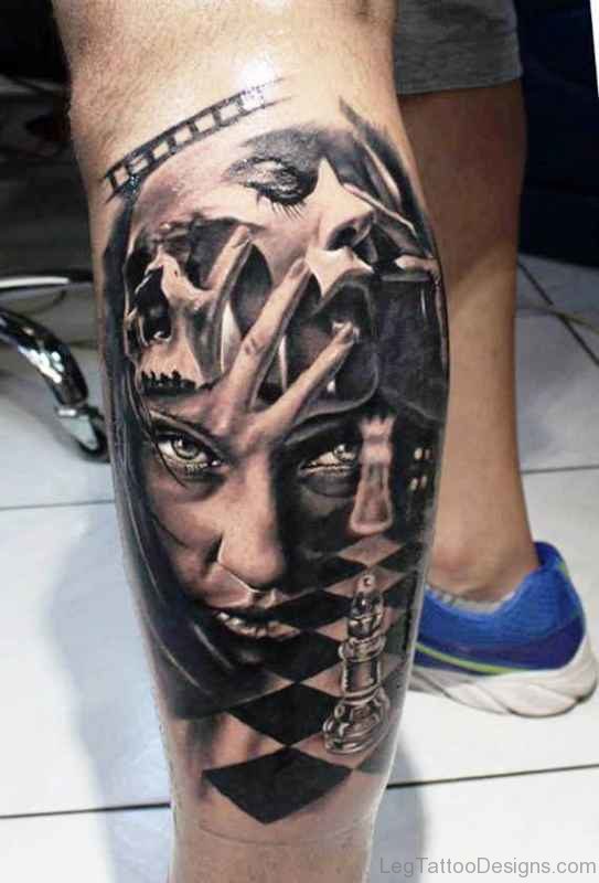 Women Face Tattoo On Calf