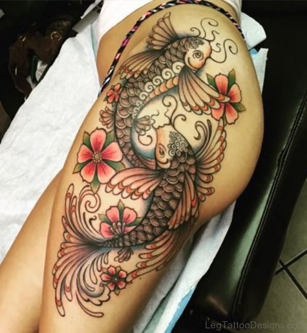 Wonderful Fish Tattoo On Thigh