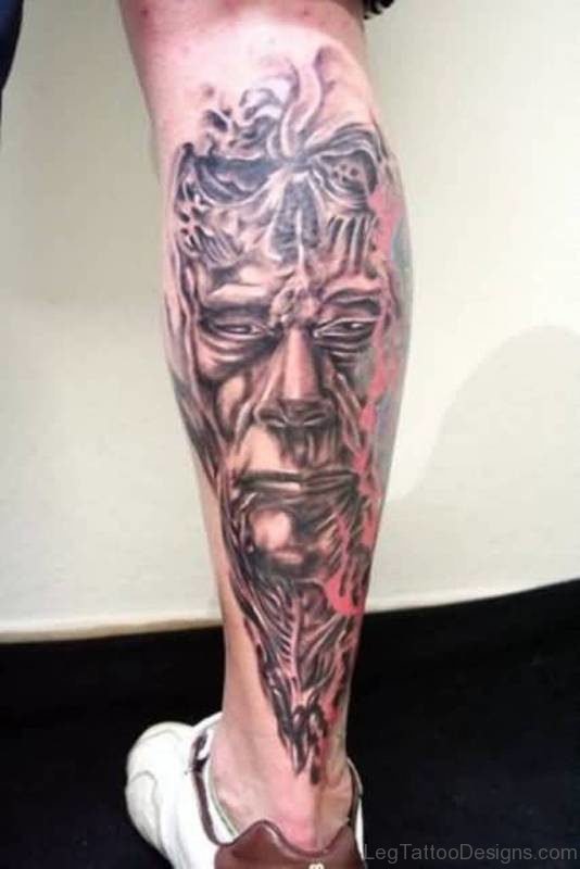 Amazing Face Mixed With Skull Tattoo On Leg