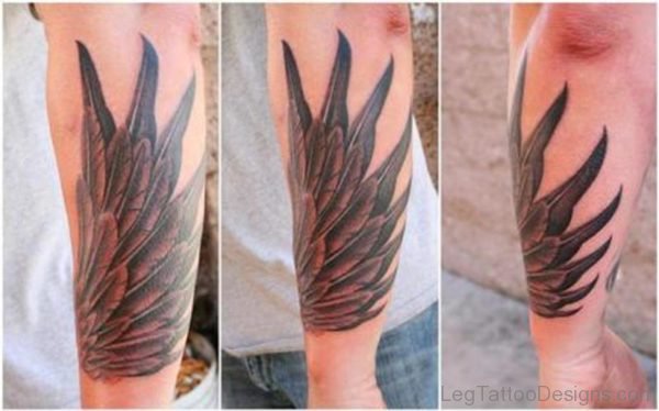 Amazing Grey Ink Wings Tattoo On Leg