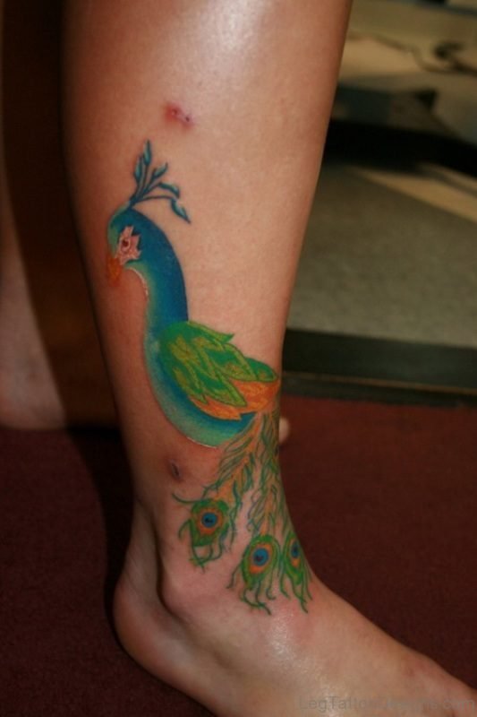Amazing Peacock Leg Tattoo