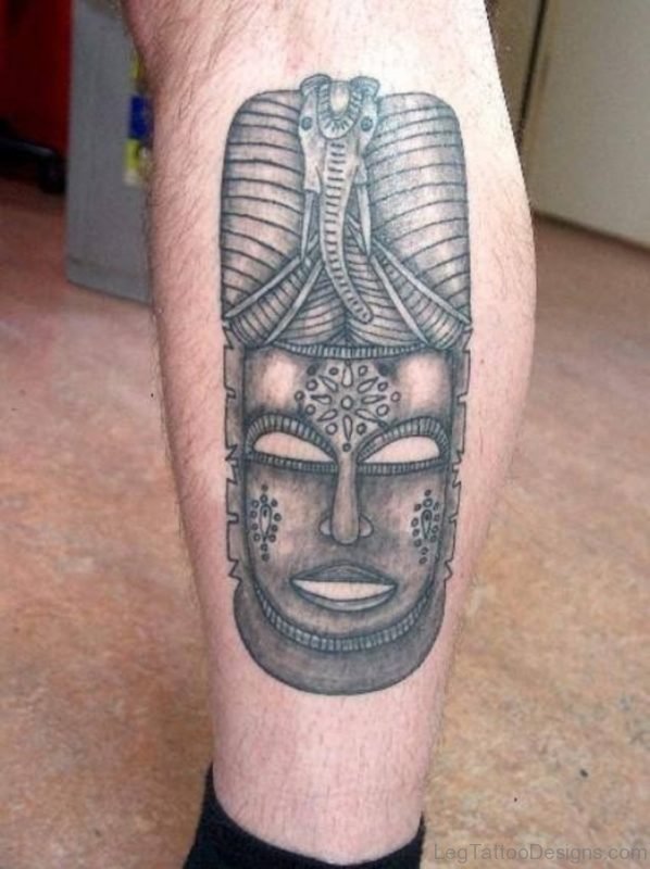 Awesome African Mask Tattoo On Legs