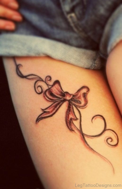 Awesome Bow Tattoo On Thigh