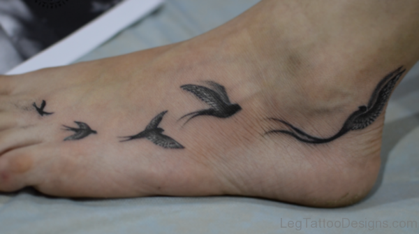 Awesome Flying Bird Tattoo On Foot