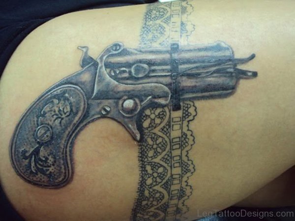 Awesome Gun Tattoo On Thigh