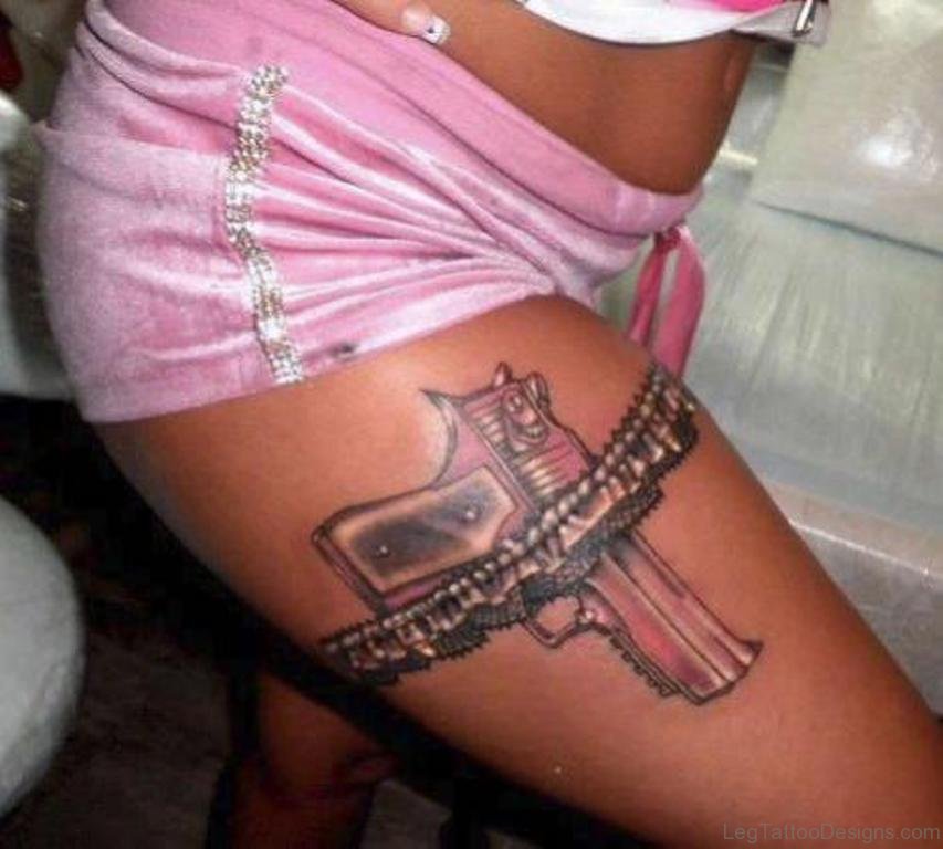 72 Delightful Gun Tattoos On Thigh.