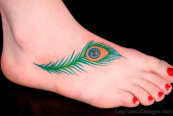 Awesome Small Peacock Feather Tattoo