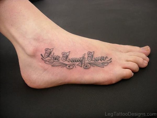 Awesome Wording Tattoo On Foot
