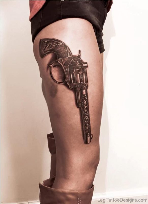Beautiful Gun Tattoo On Thigh