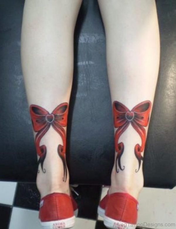 Beautiful Red Bow Tattoo On Leg