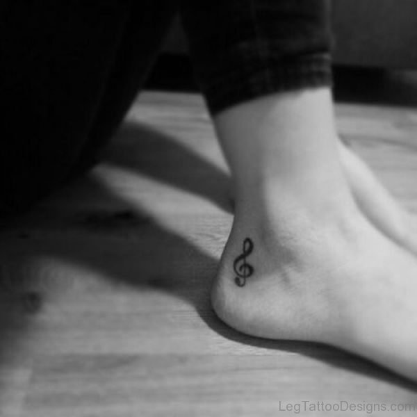 Black And White Musical Note Tattoo 