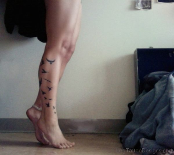 Black Flying Birds Tattoo On Leg