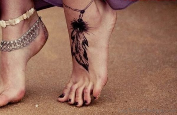 Black Ink Feather Tattoo