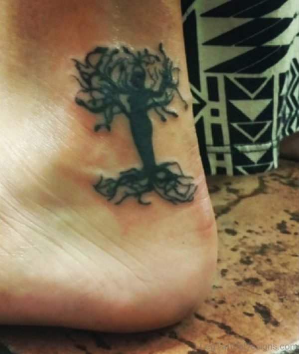 Black Ink Hebrew Tree Tattoo On Foot