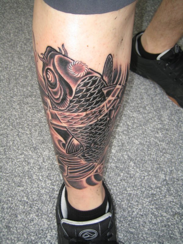 Black Koi Fiish Tattoo On Leg