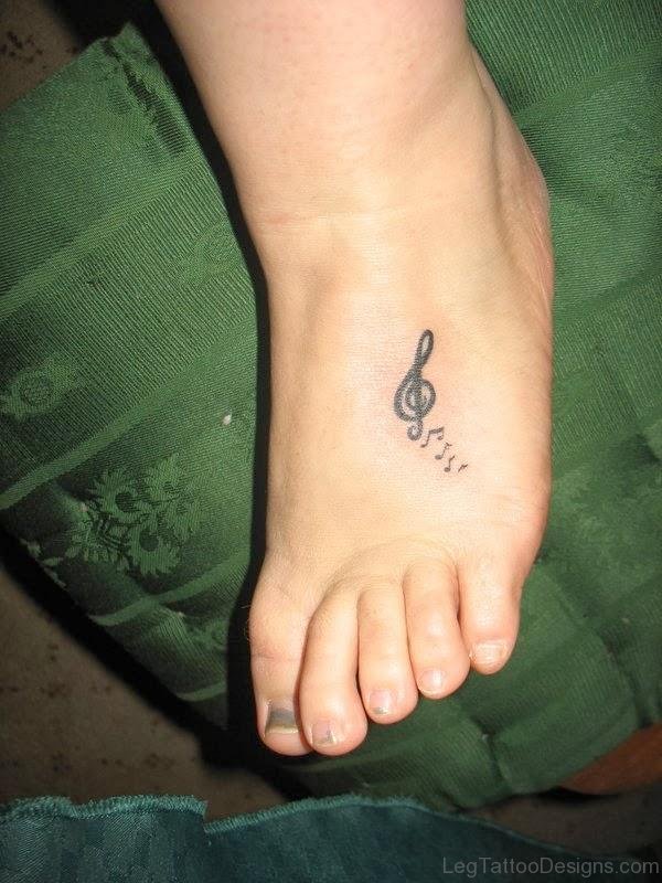 Black Music Tattoo On Foot 