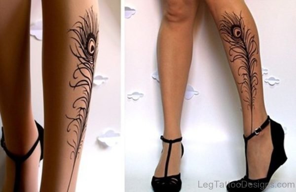 Black Peacock Feather Tattoo On Leg