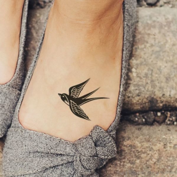 Black Swallow Tattoo On Foot