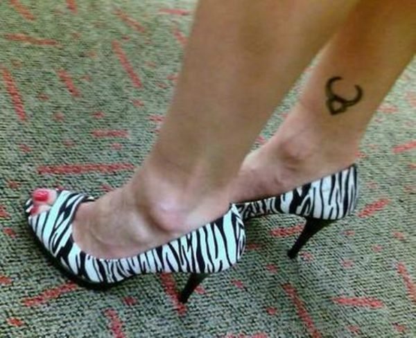 Black Taurus Tattoo On Ankle