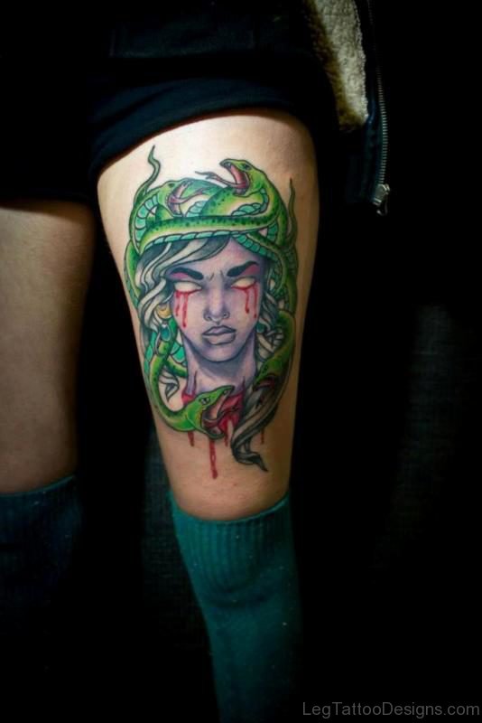 Bleeding Medusa Head Tattoo For Thigh