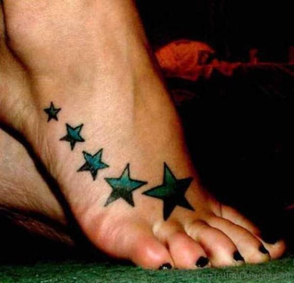 Blue Black Stars Tattoo On Foot