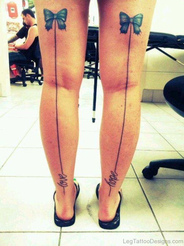 Blue Bow Tattoo On Thigh