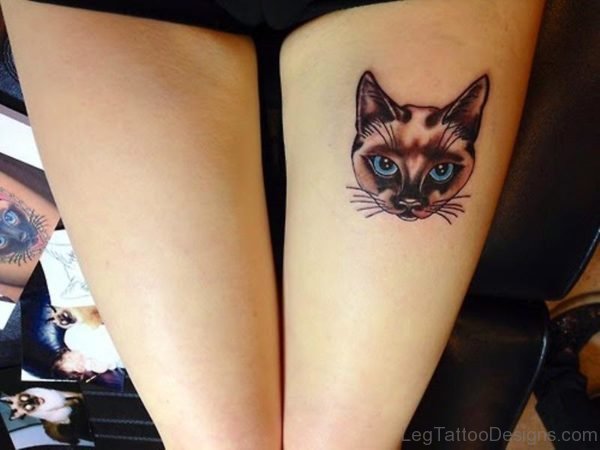 Cat Head Tattoo On Thigh