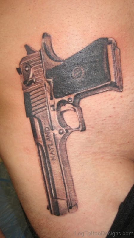 Classic Gun Tattoo On Thigh