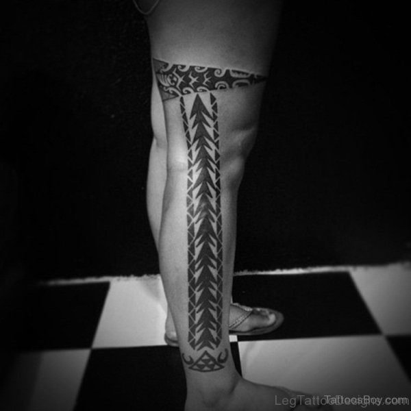 Classy Tribal Tattoo On Leg Image