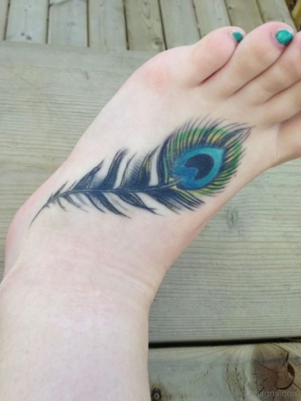 Colored Feather Tattoo On Foot