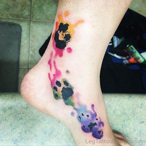 Colored Paw Tattoo On Foot